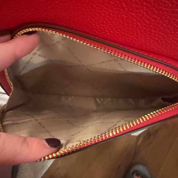 Michael Kors Jaycee Medium Backpack in a bright red pebbled leather
